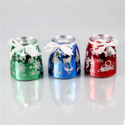 Contenedores de velas navideñas